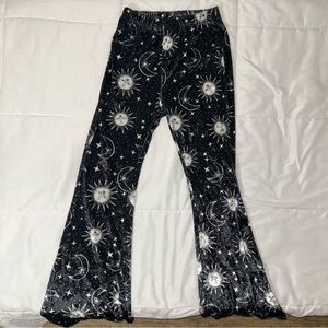 Black and white velvet flared leggings with sun and moon print